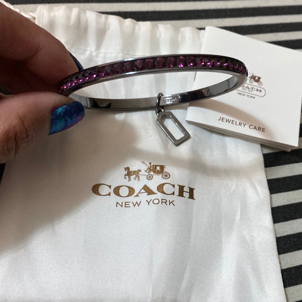 COACH Gunmetal bangle w/purple Swarovski crystals
